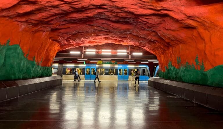 Colorful interior of Stockholm subway station featuring