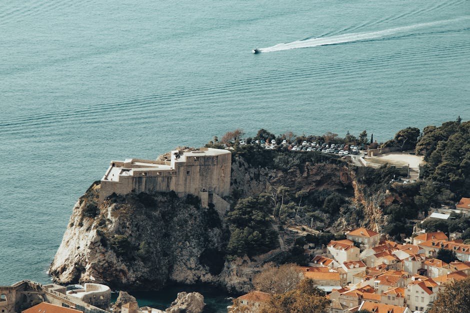 A breathtaking view of Dubrovnik's ancient fortress perched above the Adriatic Sea.