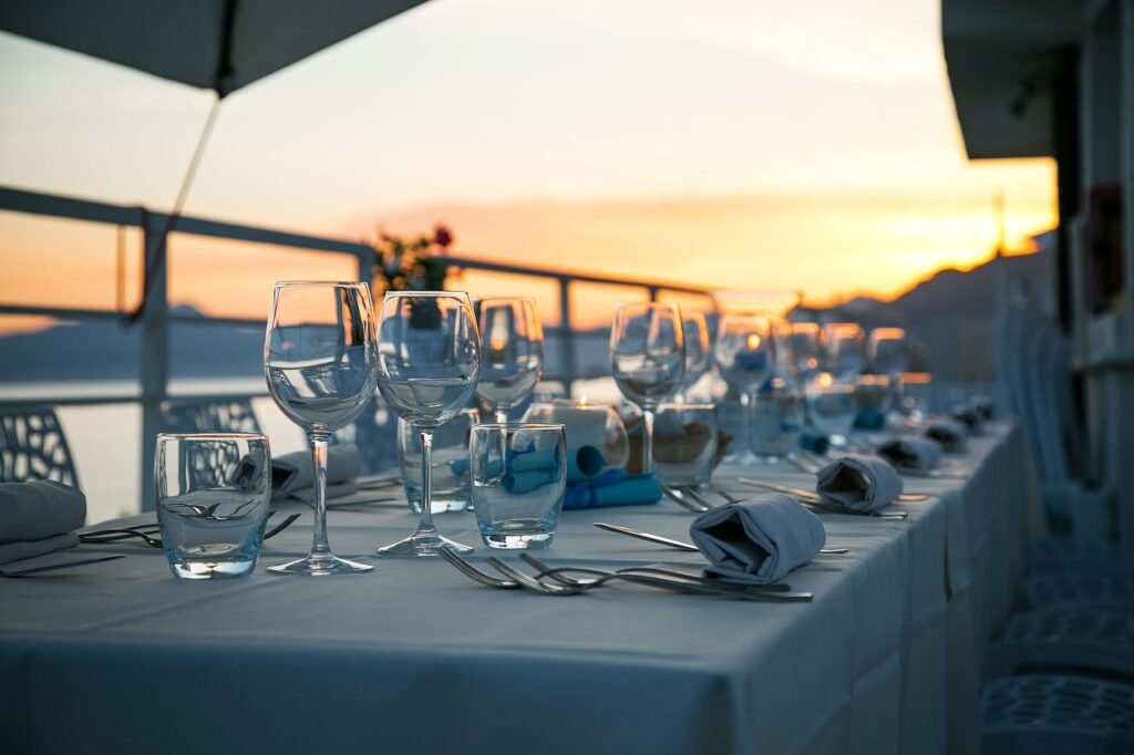 table, glassware, cutlery, silverware, stemware, dining table, dinner table, table setting, table set-up, dinner, luxury, restaurant, nature, sunset