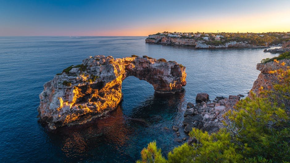 Breathtaking view of Es Pontas rock formation during sunset in Mallorca, Spain. Perfect for travel inspiration.