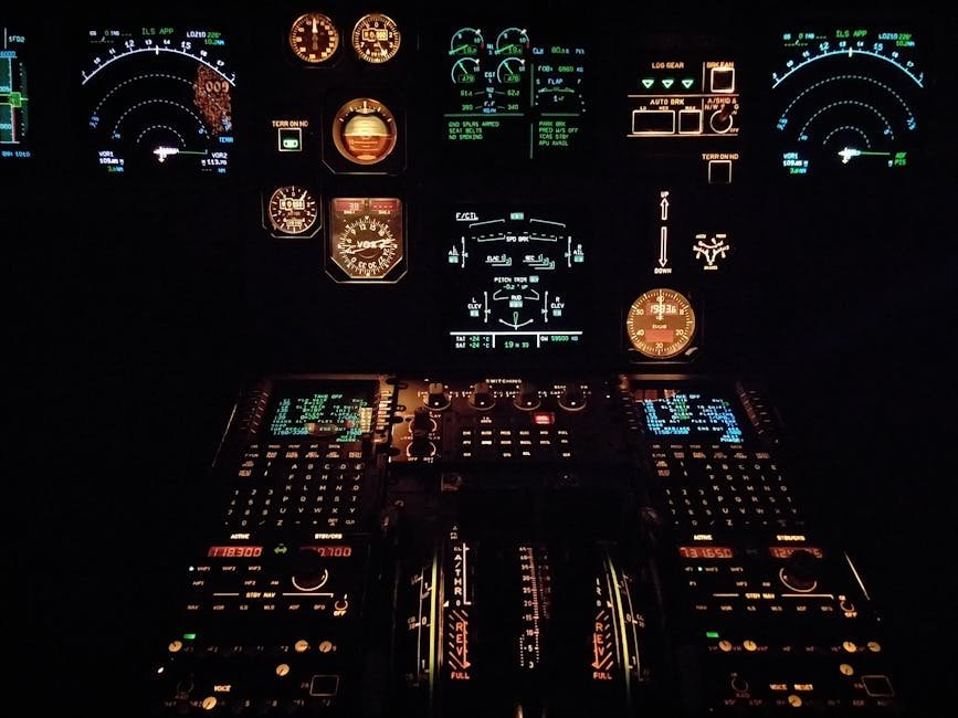 Close-up view of an aircraft cockpit illuminated at night with various gauges and instruments.