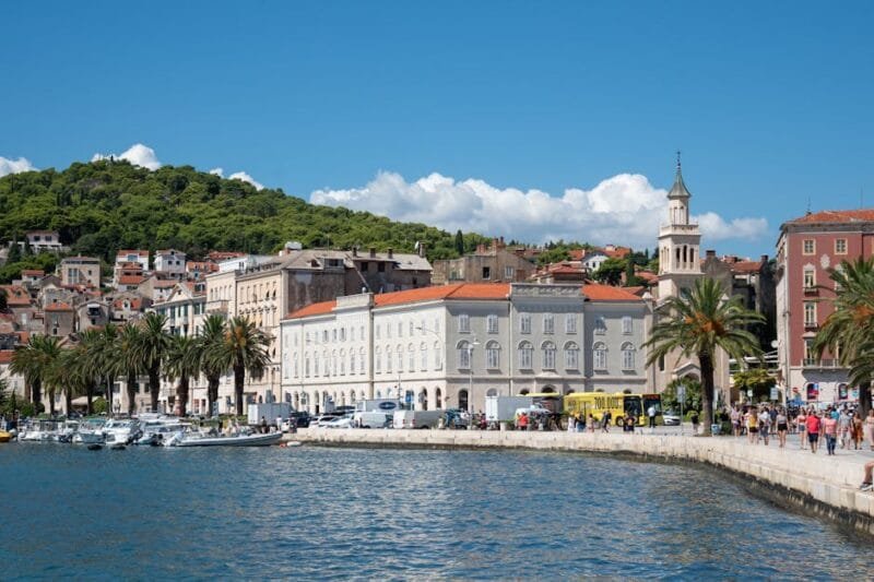 Explore the vibrant waterfront and stunning architecture of Split, Croatia on a sunny day.