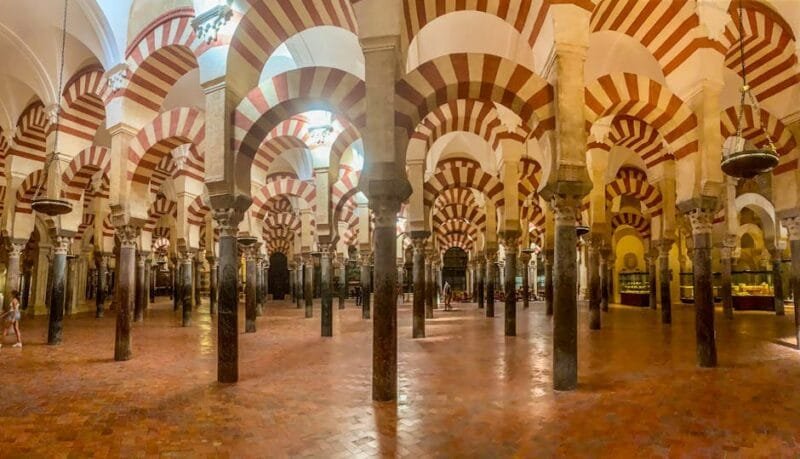 Stunning interior view of the Mosque-Cathedral of Córdoba with iconic arches.