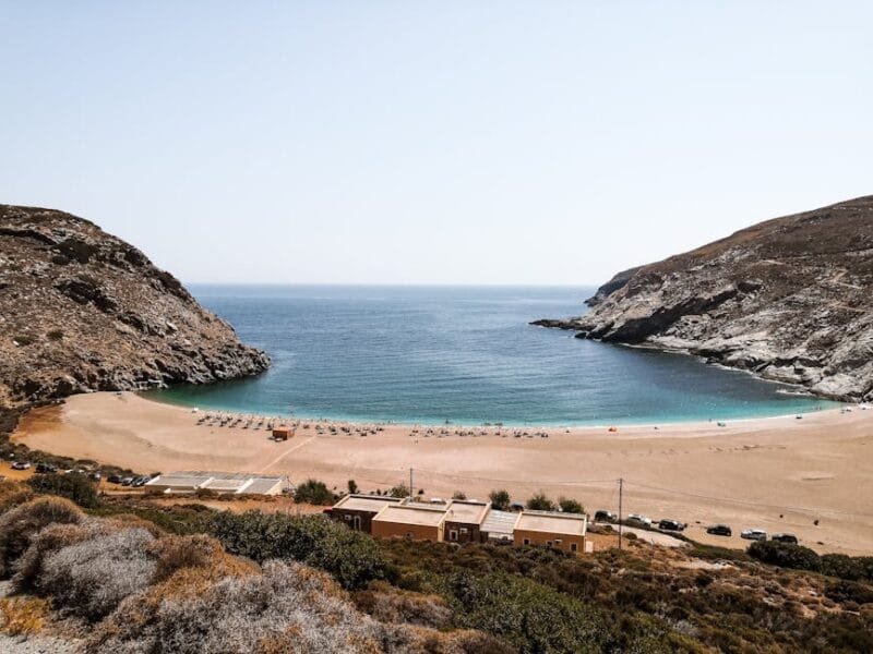 Andros | Dalle Spiagge Nascoste ai Villaggi Tradizionali 1 A stunning aerial view of a tranquil beach cove in Andros, Greece, with