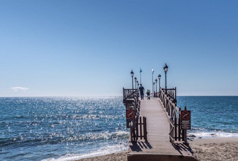 Cosa Vedere a Marbella | Dal Porto Banús al Casco Antiguo 1 Relaxing view from a pier in Marbella, perfect for leisure and travel inspiration.